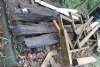 PILE OF TREATED LUMBER & TIMBERS