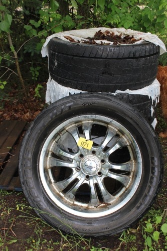 SET OF 4 - 305/50/R20 TIRES ON ALUMINUM RIMS