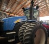 2010 NEW HOLLAND T9030 W/ 4 REMOTES, 20.8R42 RUBBER, 16F/2R POWER SHIFT, 670 HOURS SHOWING, CLOCK CHANGED @ 2450 HOURS - 4