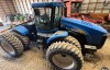 2010 NEW HOLLAND T9030 W/ 4 REMOTES, 20.8R42 RUBBER, 16F/2R POWER SHIFT, 670 HOURS SHOWING, CLOCK CHANGED @ 2450 HOURS - 2