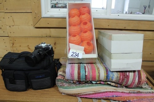 2- RUGS, MINOLTA CAMERA, 4 - STRINGS OF PATIO LIGHTS