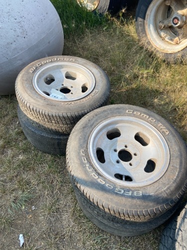 4 - BF GOODRICH P215/65R15 TIRES W/ RIMS