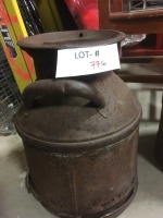antique cream can (rusted bottom)