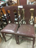 2 wooden chairs w/ leather seats