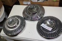 3 1959 pontiac hubcaps