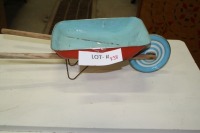 vintage toy tin wheelbarrow