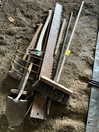 Assortment of yard tools, ax, sledge, hammer, spade