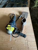 Angle grinder, pick axe head