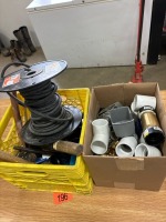 Assortment of plumbing supplies and hammers and wire