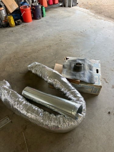 Attic vent/ assortment of duct work