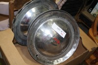 4 Chevy hubcaps