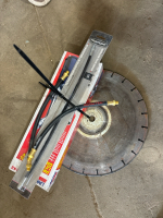 Grease gun / hose / 2 chop saw blades