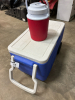 Coleman cooler and water bottle