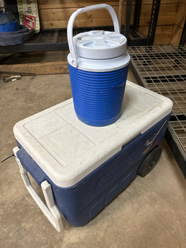 Coleman cooler and water bottle