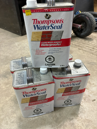 5 new jugs of Thompson water seal. Clear in color