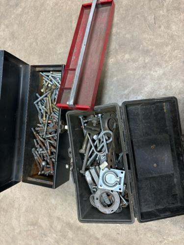 Assortment of bolts and two tool boxes