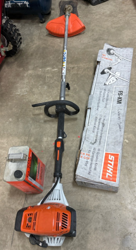 Stihl weed whacker w/blade comes w/part jug of fuel