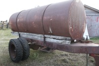 1000 gal. Tank on tandem axle trailer