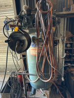 Large air compressor and hose reel