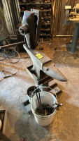Anvil on stand with vice
