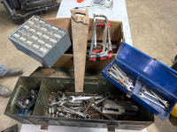 Assorted wrenches and stapler