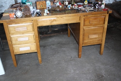 5' wooden desk w/ 6 drawers (contents not included)