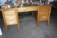 5' wooden desk w/ 6 drawers (contents not included)