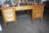 5' wooden desk w/ 6 drawers (contents not included)