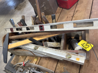 Assortment of hammers levels t square etc