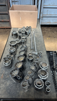 Assortment of 3/4 drive sockets, extension and bar