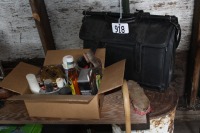 box of shoe polish, briefcase, cane