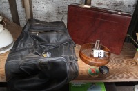 briefcase, nutcracker set, dufflebag