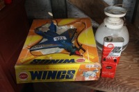 antique toy plane, light fixture, tins