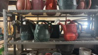 7- watering cans