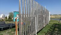 2-30 ft self stand wind break panels w/1-14 ft gate
