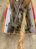 Assortment of hammer heads and wrenches