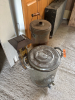 Antique canisters and bird feeder