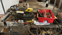 Assortment of belts, wrenches, tools