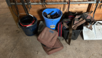 Assortment of tack, pales, saddle bags