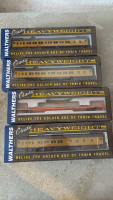 3 toy train cars. 1 flat deck
