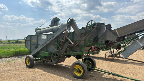 John Deere threshing machine