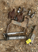 Assorted hitches, balls and grease gun