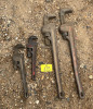 4 assorted pipe wrenches