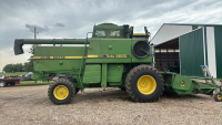 John Deere 8820 combine with pickup header