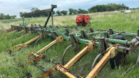 JD 1610 cultivator with Degelman harrows and valmar