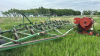 JD 1610 cultivator with Degelman harrows and valmar - 2