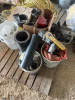 Assortment of piping supplies