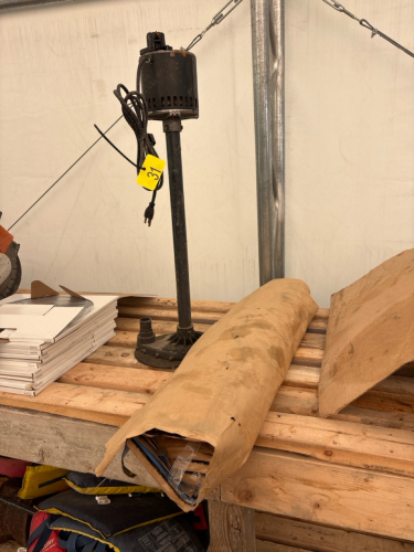 Part roll of blue skin & sump pump