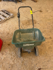 Golf green grass spreader