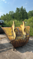 Slope trenching bucket
